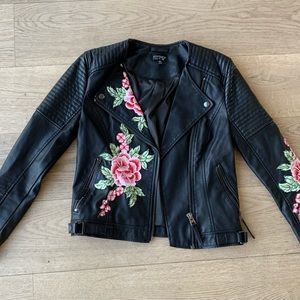 Adorable leather embroidered biker jacket in very good condition.